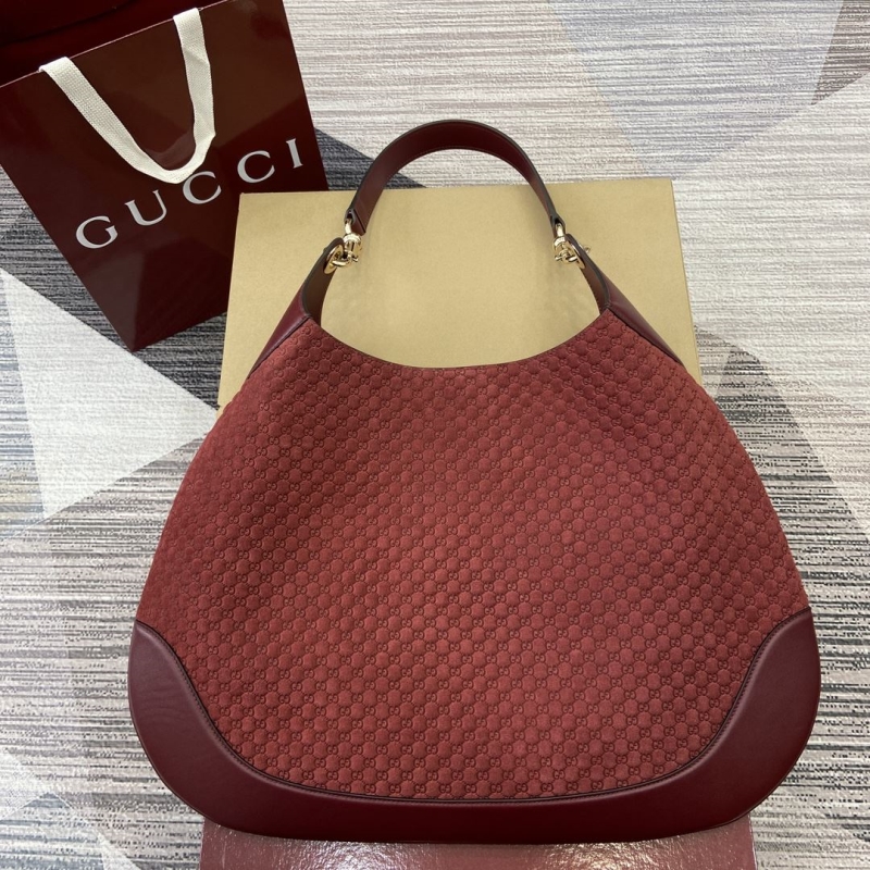 G*u*i top handle bags